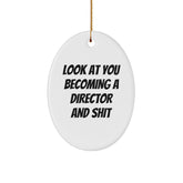 Funny Director Oval Ornament, Gifts from Men to Director Friends for Christmas, Look At You Becoming A Director And Shit - Image 1